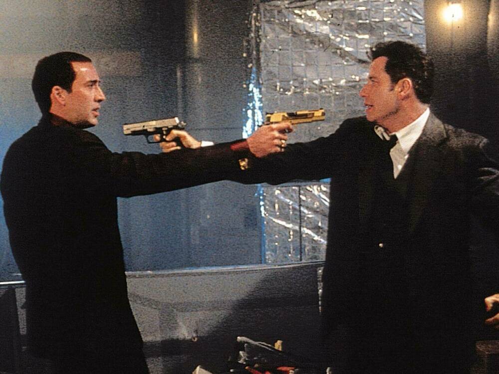 Nicolas Cage (l.) und John Travolta in "Im Körper des Feindes" aus dem Jahr 1997.