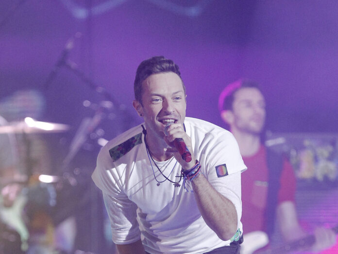 Coldplay-Frontmann Chris Martin gibt auf der Bühne alles.
