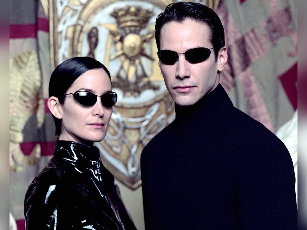 Kennen sich im neuen Teil nicht mehr: Carrie-Anne Moss und Keanu Reeves als Trinity und Neo in "Matrix"