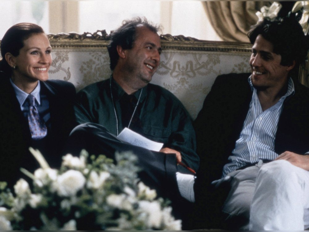 Regisseur Roger Michell (M.) mit seinen "Notting Hill"-Hauptdarstellern Julia Roberts und Hugh Grant.