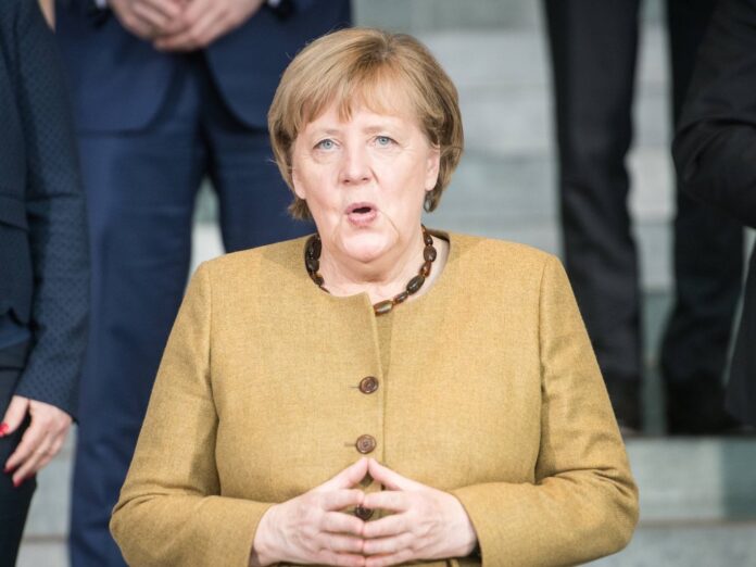 Für Angela Merkel wird es rote Rosen regnen.