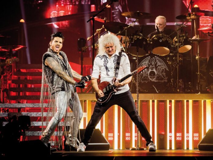 Adam Lambert (l.) mit Queen-Gitarrist Brian May (M.) und Schlagzeuger Roger Taylor.