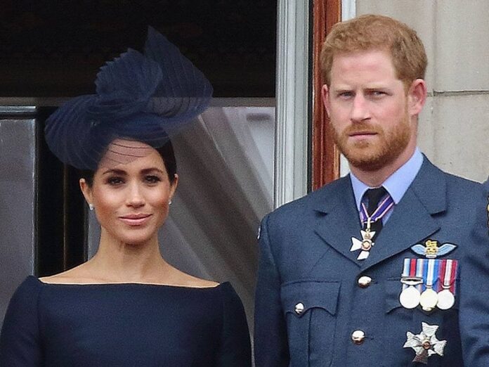 Prinz Harry und Herzogin Meghan auf dem Balkon des Buckingham Palastes im Jahr 2018.