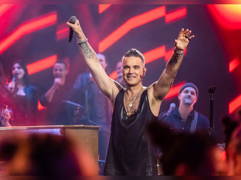 Robbie Williams auf der Bühne von "Your Songs".