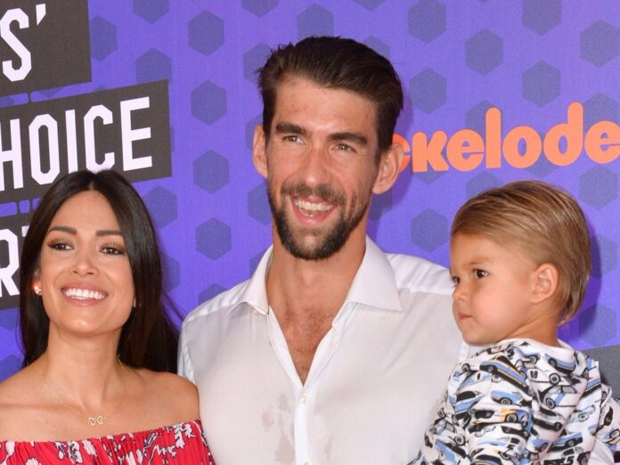 Nicole und Michael Phelps im Jahr 2018 mit ihrem erstgeborenen Sohn Boomer